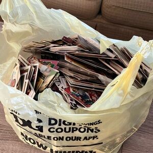 Bag full of football and basketball cards